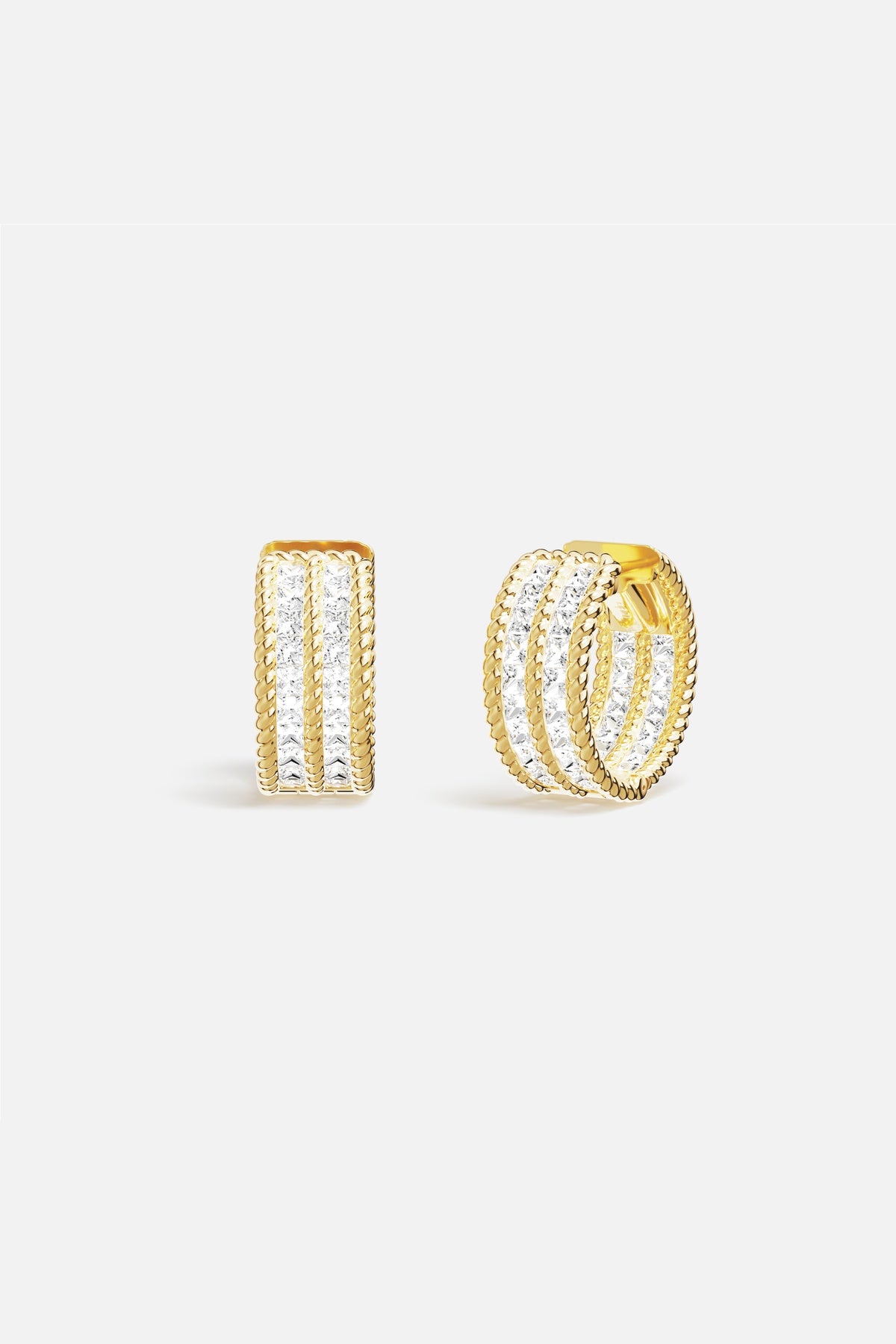 APM Earrings in golden color, twisted lines and radiant sparkle, effortlessly refined.