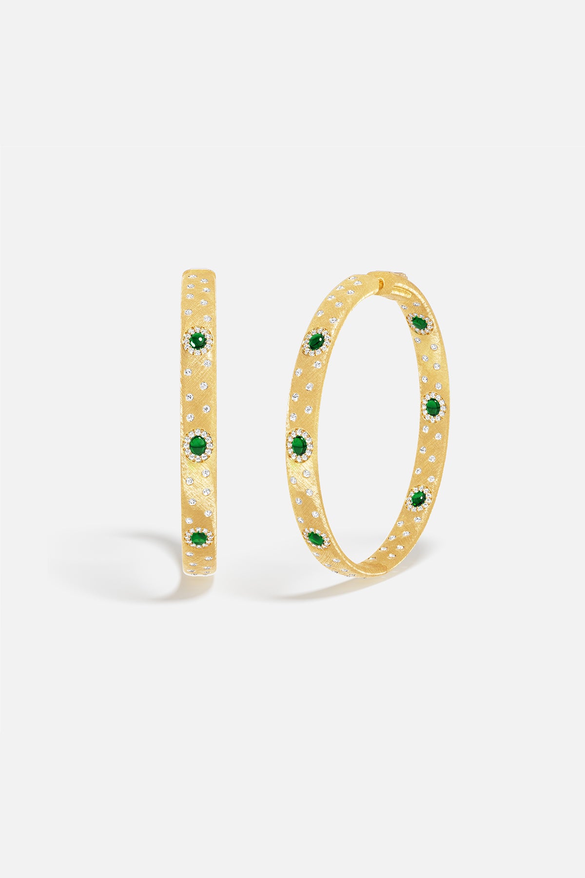 APM Hoop Earrings in golden hue, scattered with green stones, effortlessly radiant.