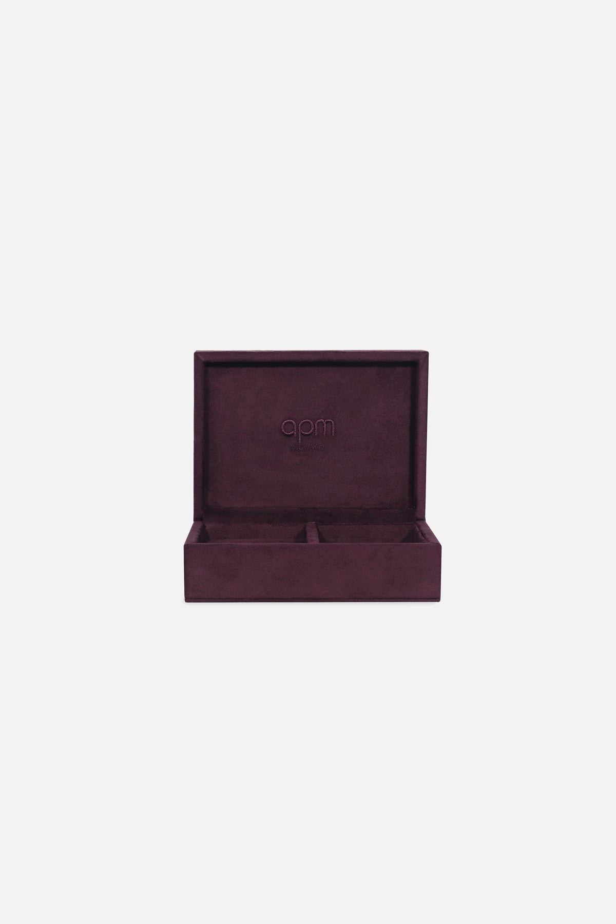 APM Monaco jewelry box in deep plum velvet, quietly luxurious and effortlessly refined.