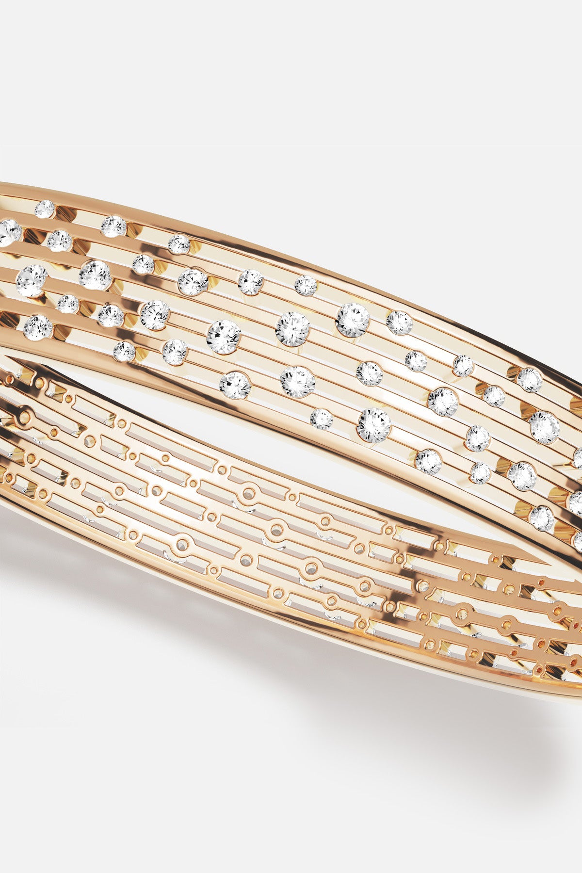 APM Monaco bangle in golden hues, scattered crystals shimmer like a soft constellation.