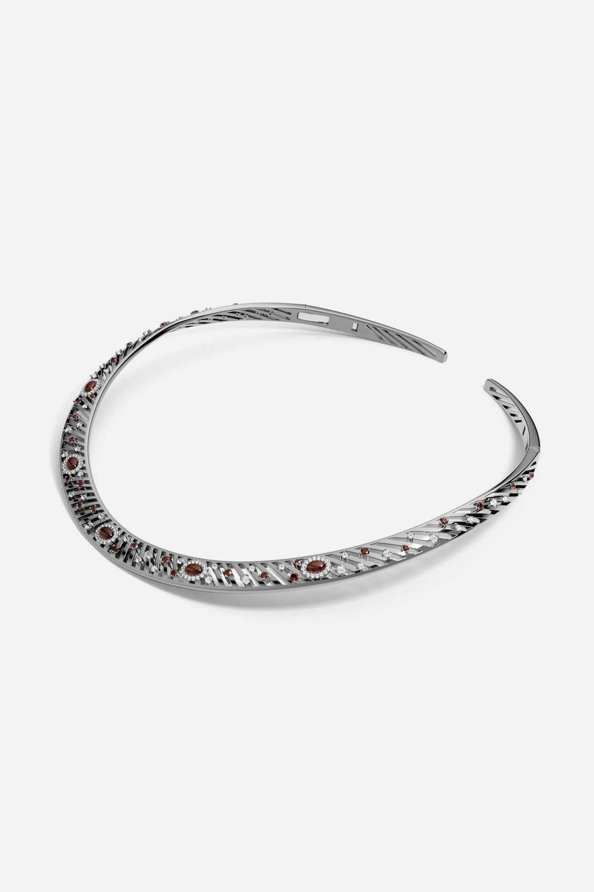 APM choker in rhodium finish, sculpted curves scattered with warm hues.