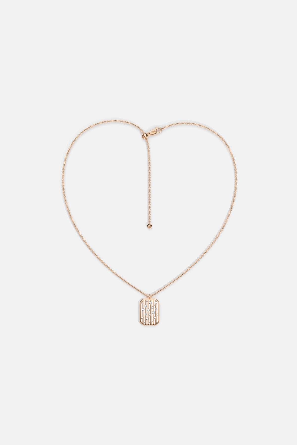 APM pendant necklace in rose gold color, a quietly modern signature.