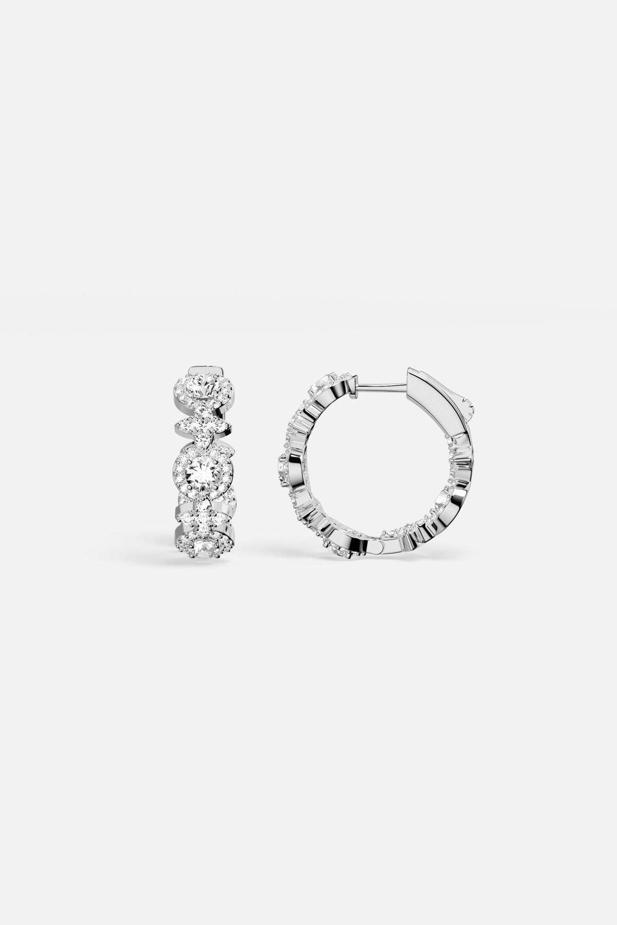 APM Hoop Earrings, a luminous rhythm of light and effortless elegance.