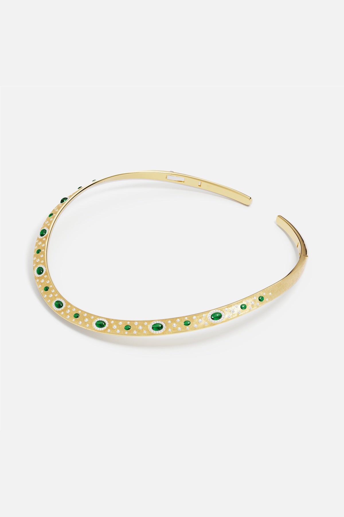 APM Monaco choker in golden hue, scattered green stones for a poetic modern glow.