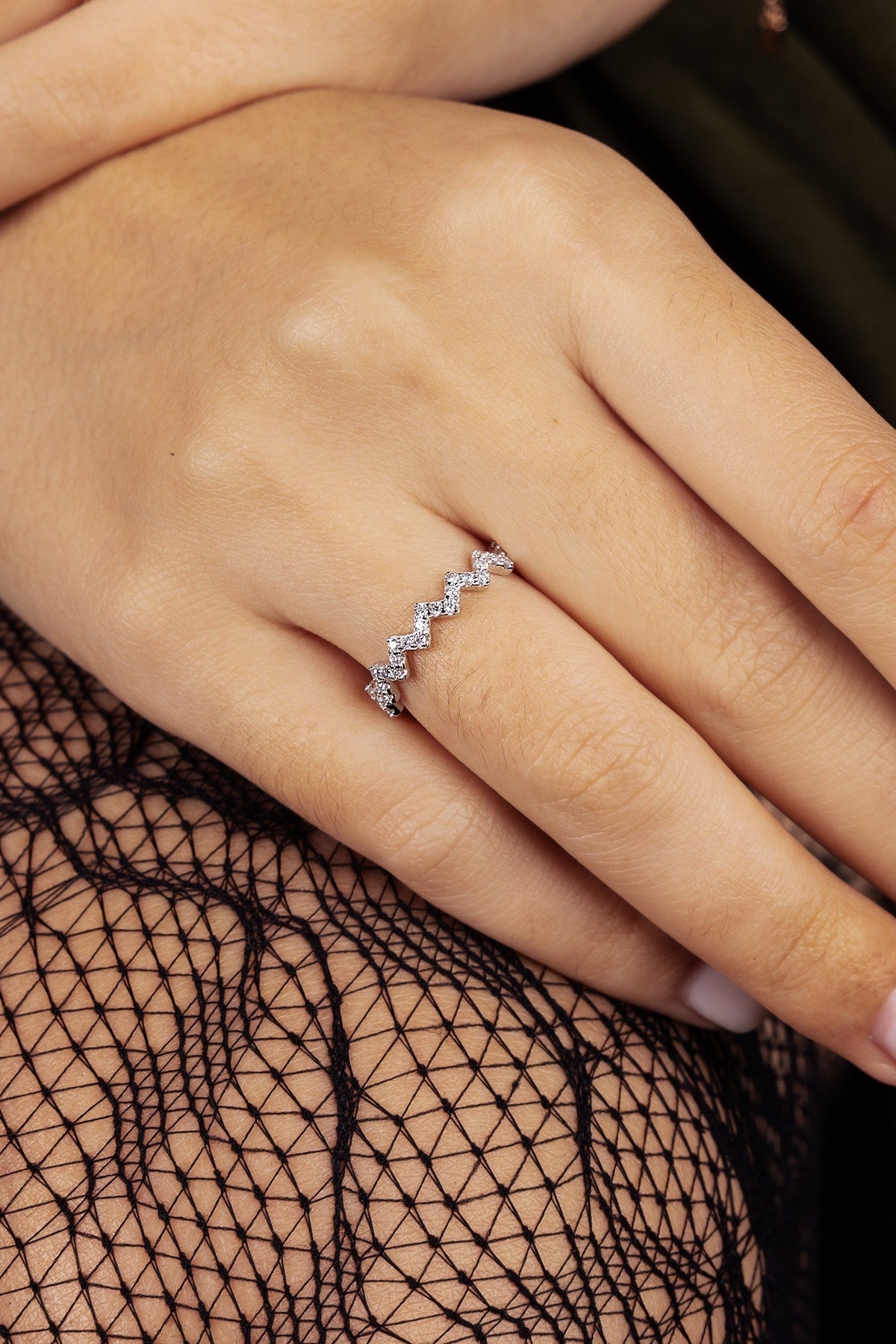 Close-up of a hand wearing a  ring