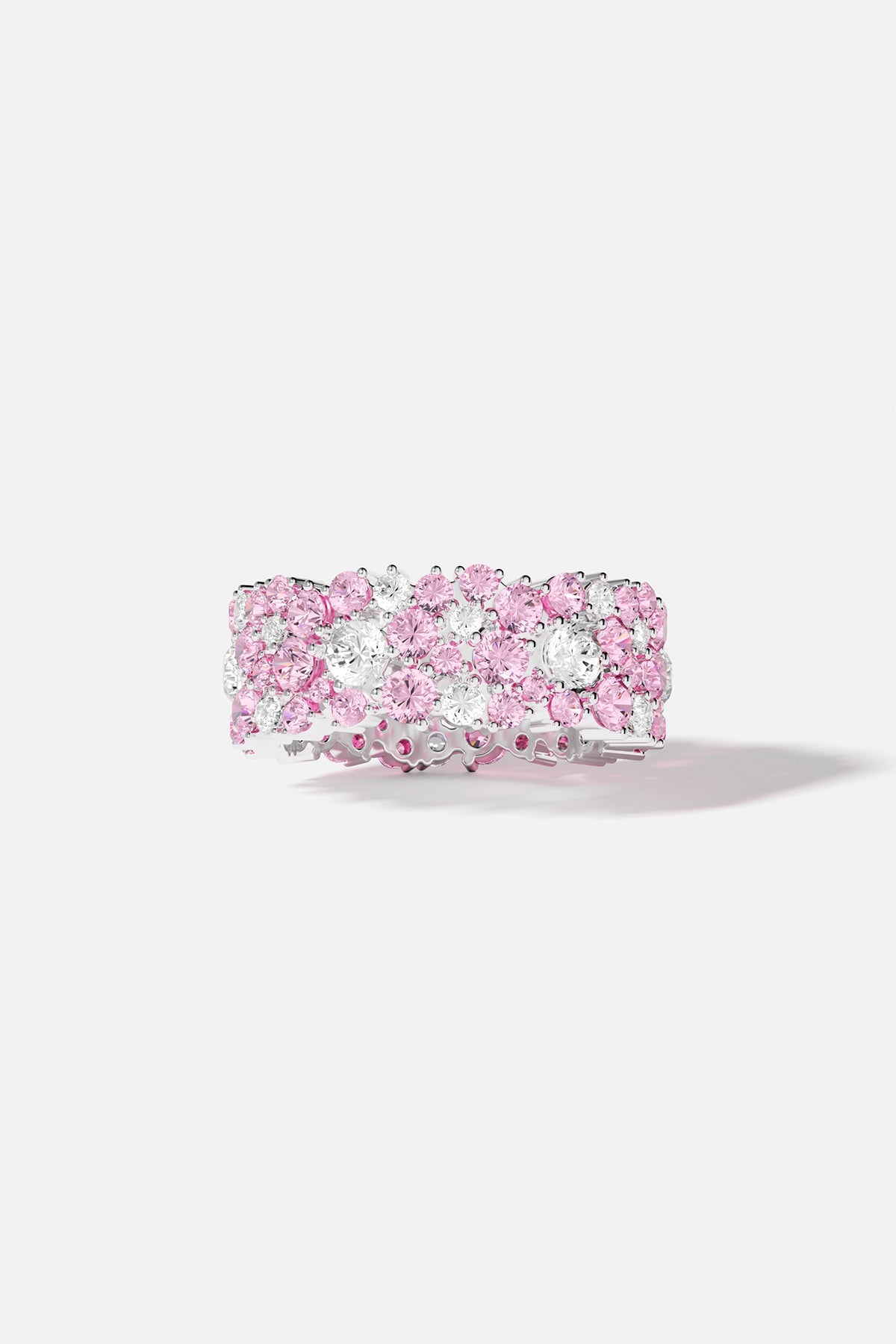 Rings APM Monaco: rose-drop ring with pink and white crystals on a silver band.