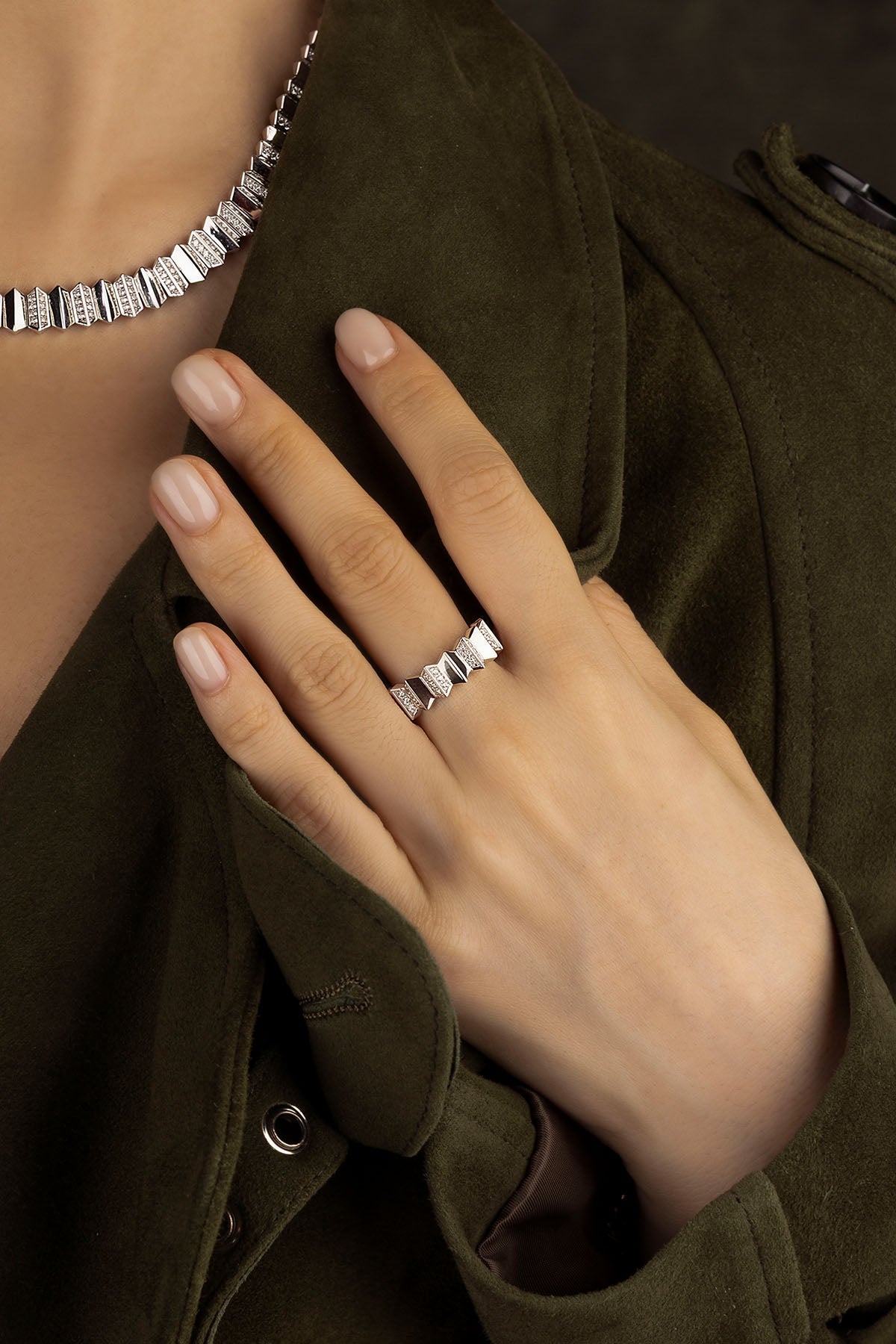 Close-up of a hand wearing APM Monaco Up and Down Ring in Silver