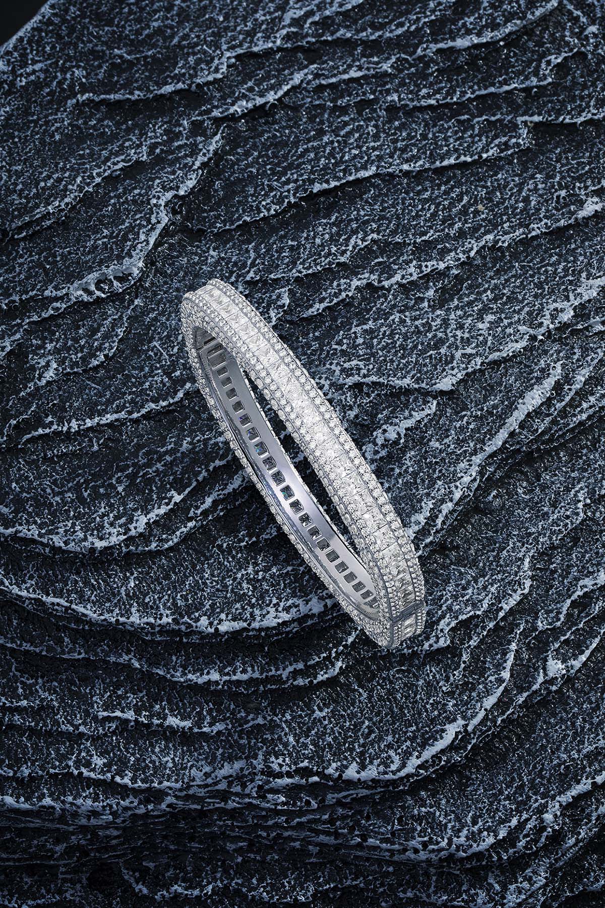 Bracelets APM Monaco pavé bangle with white diamonds in silver-tone metal.