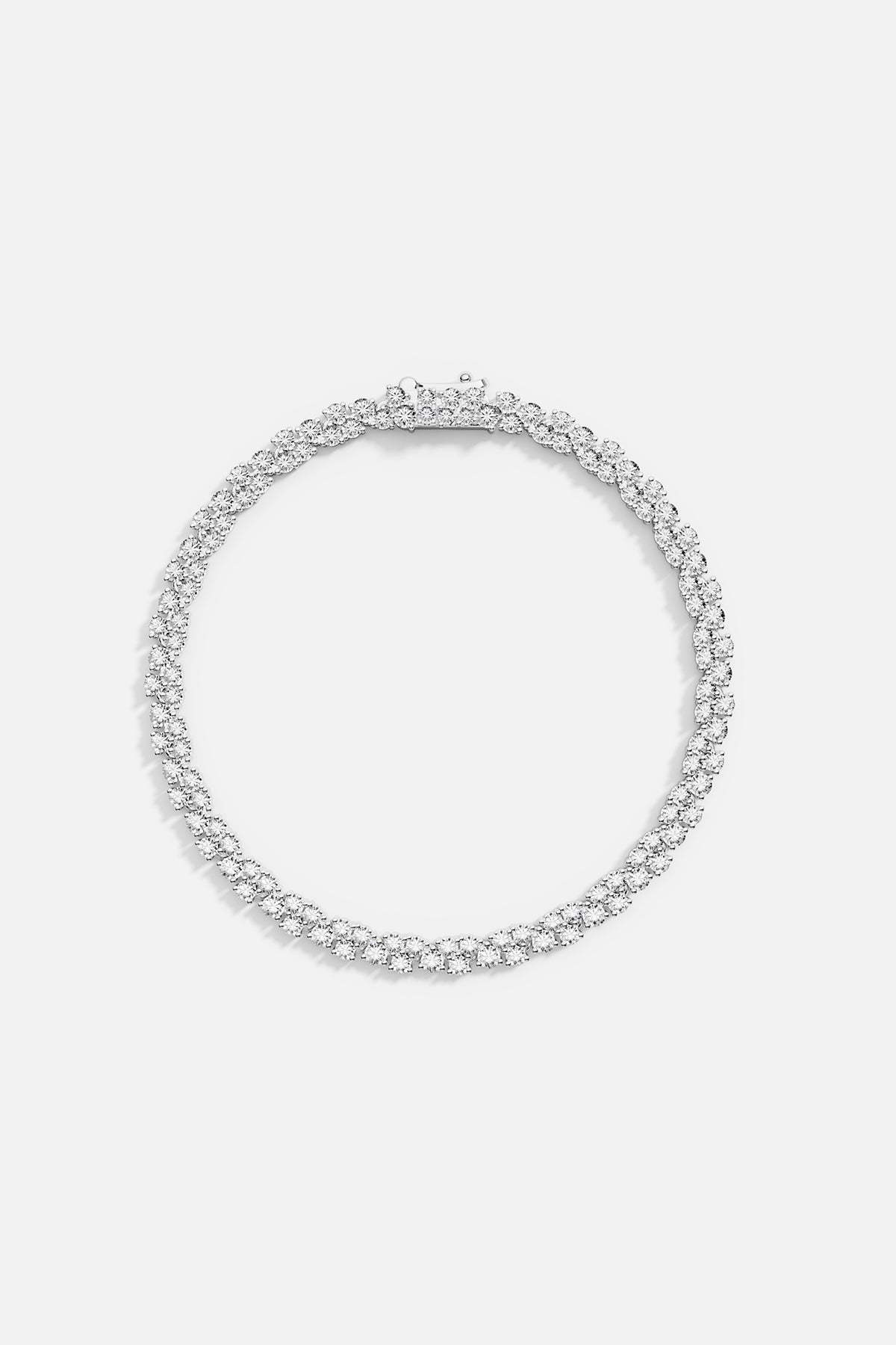 Bracelets APM Monaco round pavé diamond bracelet in white gold tone.