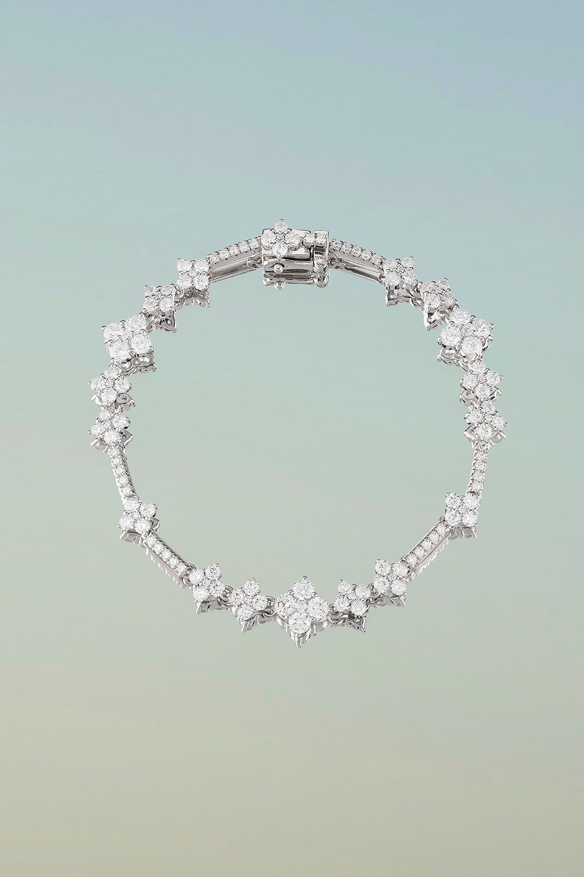 Bracelets APM Monaco pavé diamond bracelet with flower motifs in white tone.