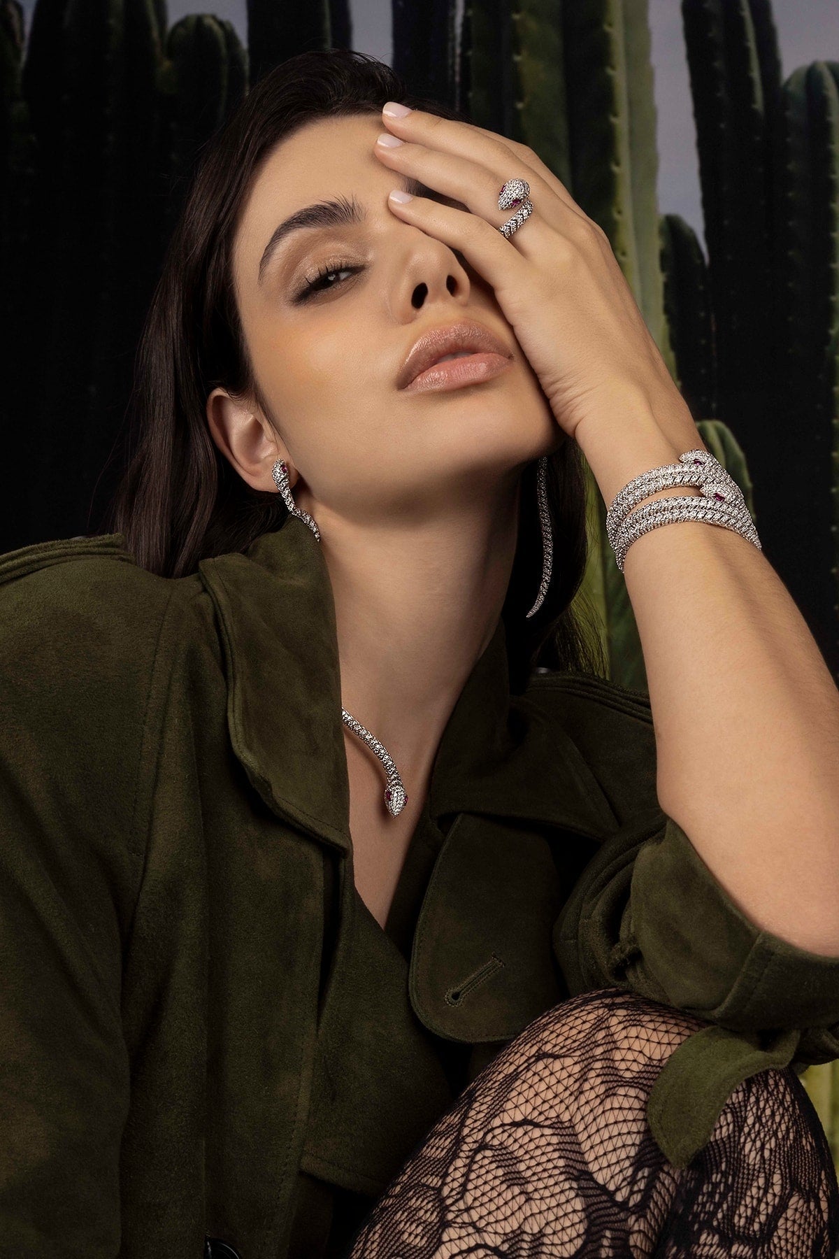 Bracelets APM Monaco pavé double-wrap snake bangle in silver worn on hand