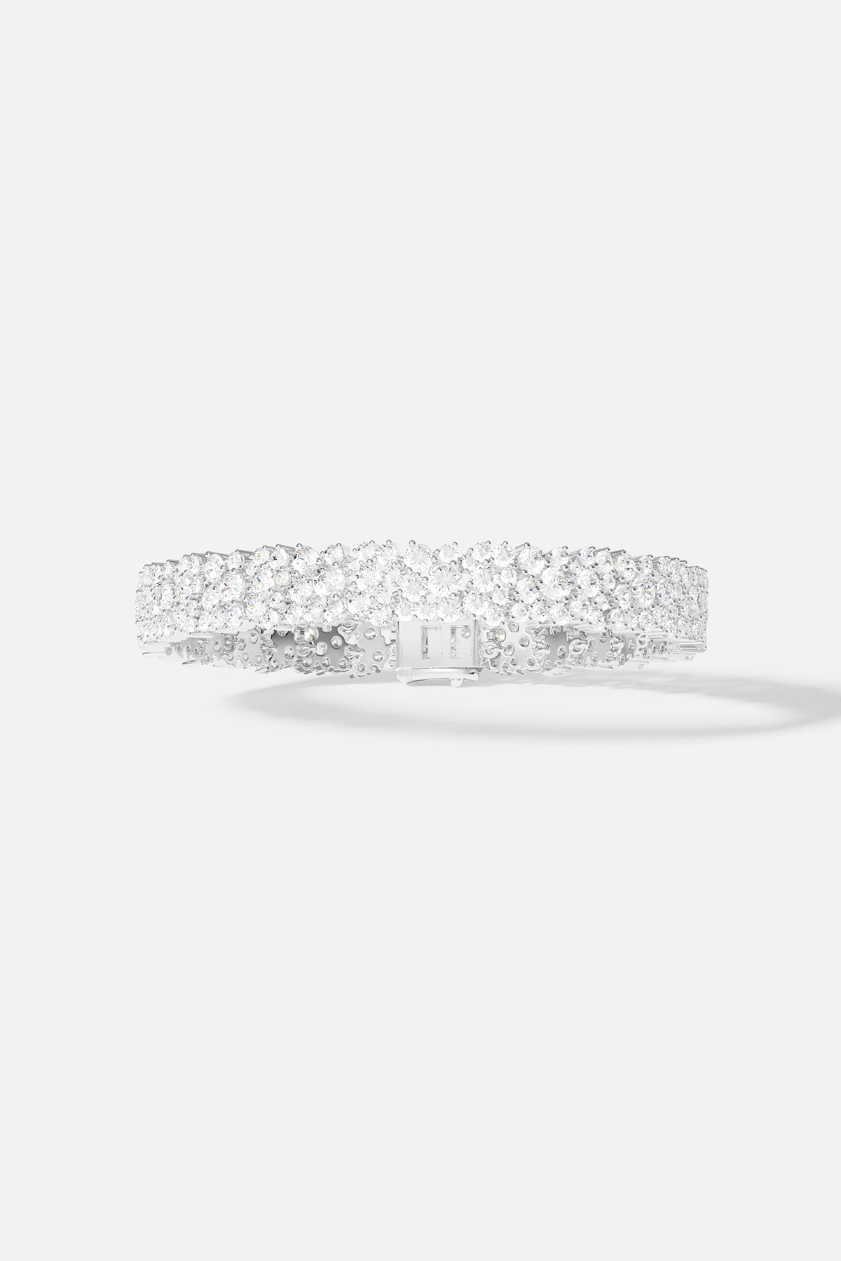Bracelets APM Monaco triple white diamond pavé bracelet.
