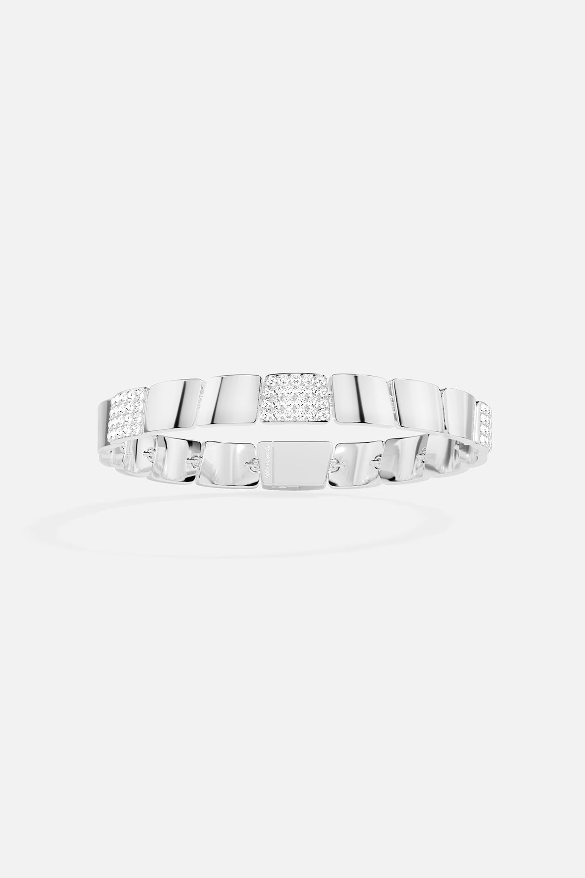 Silver bangle with white stones on a white background