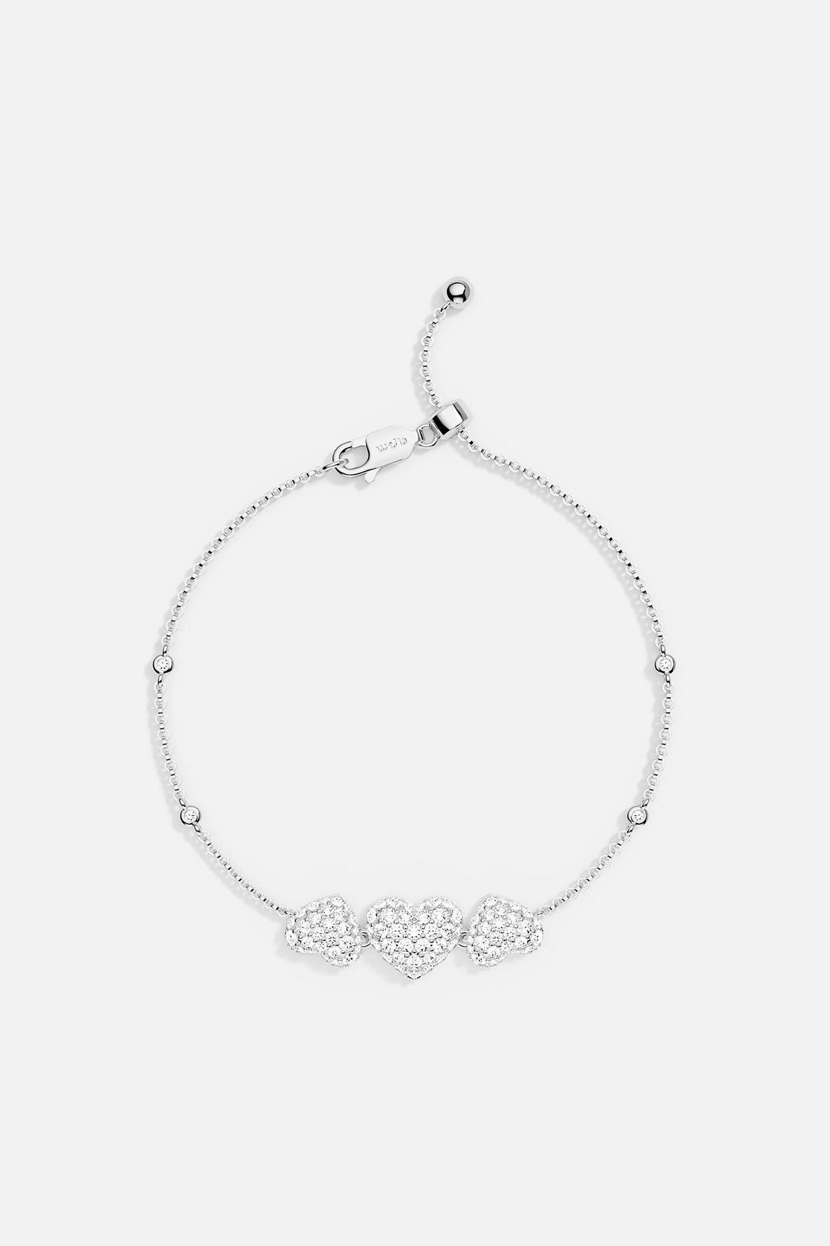APM MONACO heart-shaped adjustable bracelet in silver on a white background