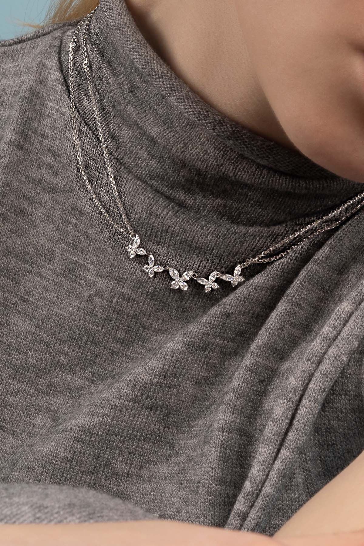 Necklaces APM Monaco: silver double-chain, adjustable multi-strand necklace with five jeweled butterflies.