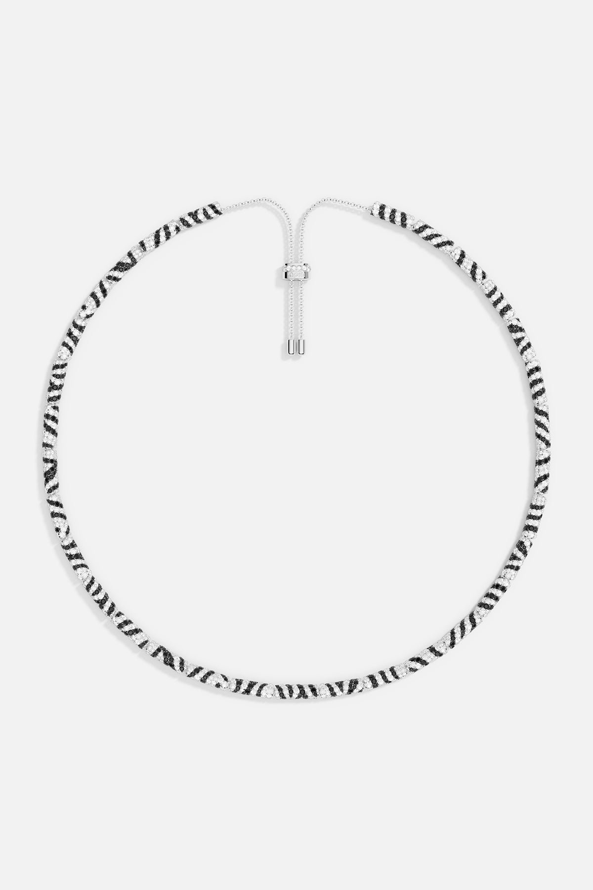 Necklaces APM Monaco, adjustable necklace with a black and white zebra pattern.
