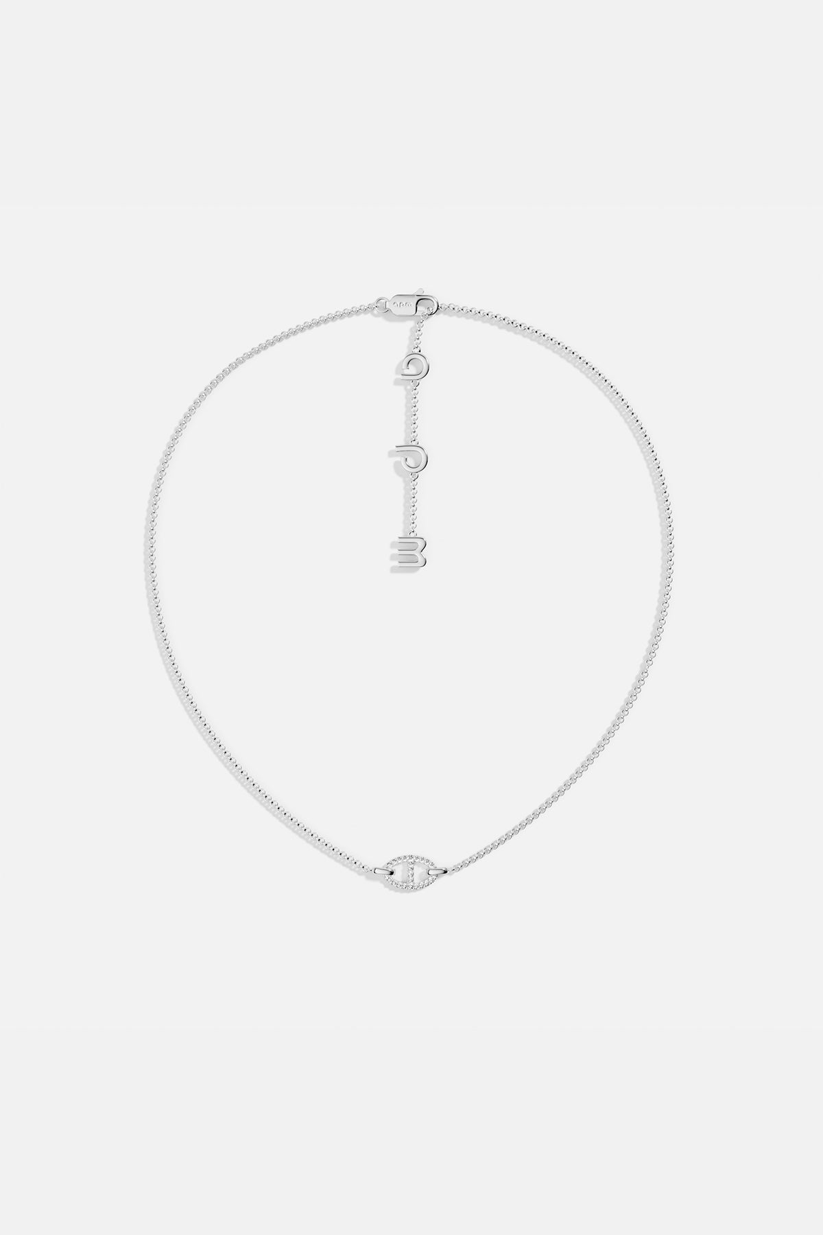 Necklaces APM Monaco, white tone, maille marine chain with a pendant of three hanging letters.