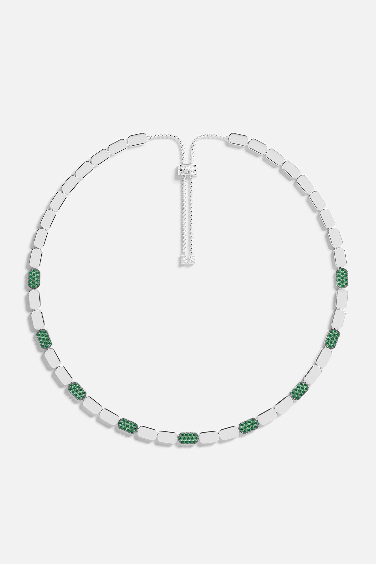 Necklace with green stones on a white background