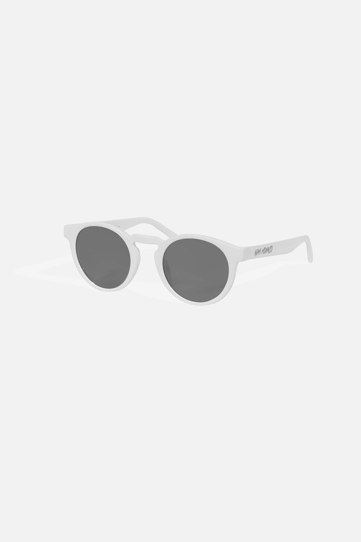 APM MONACO sunglasses with white frame and gray lenses on a white background