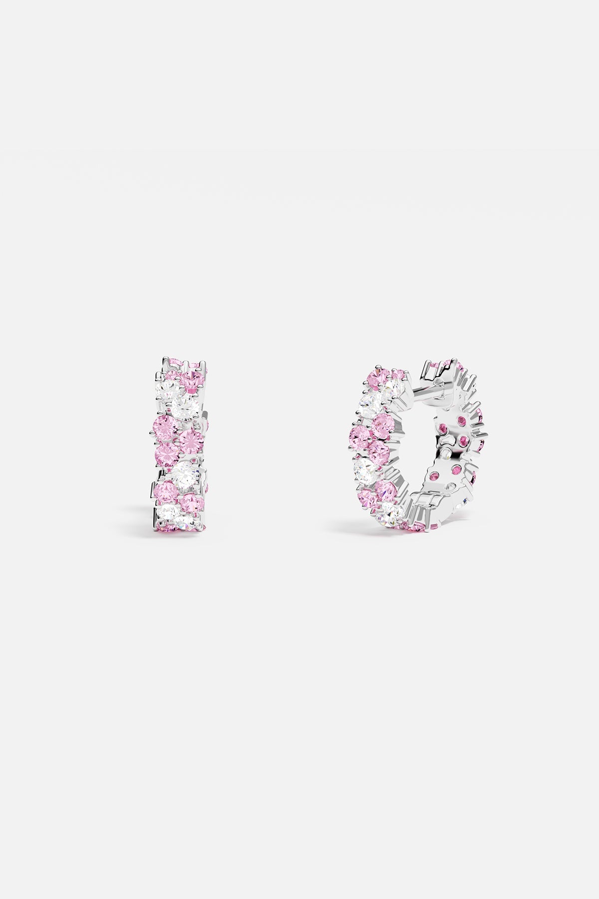Earrings APM Monaco rose gold drop-huggie with pink and white gems.