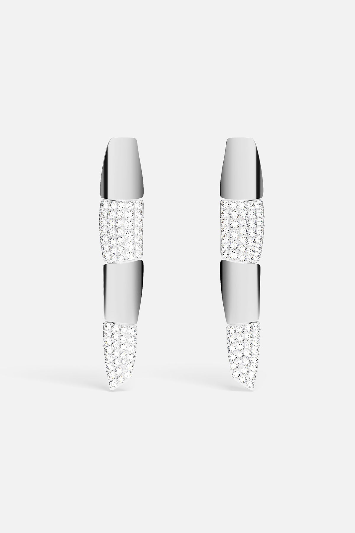 Pair of silver earrings on a white background