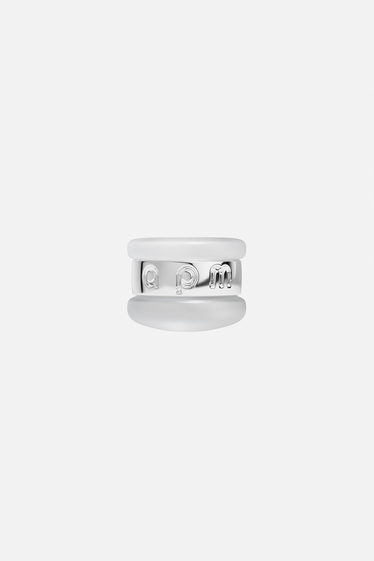 Rings APM Monaco, triple ring in white sterling silver with the letters APM engraved on the central ring.