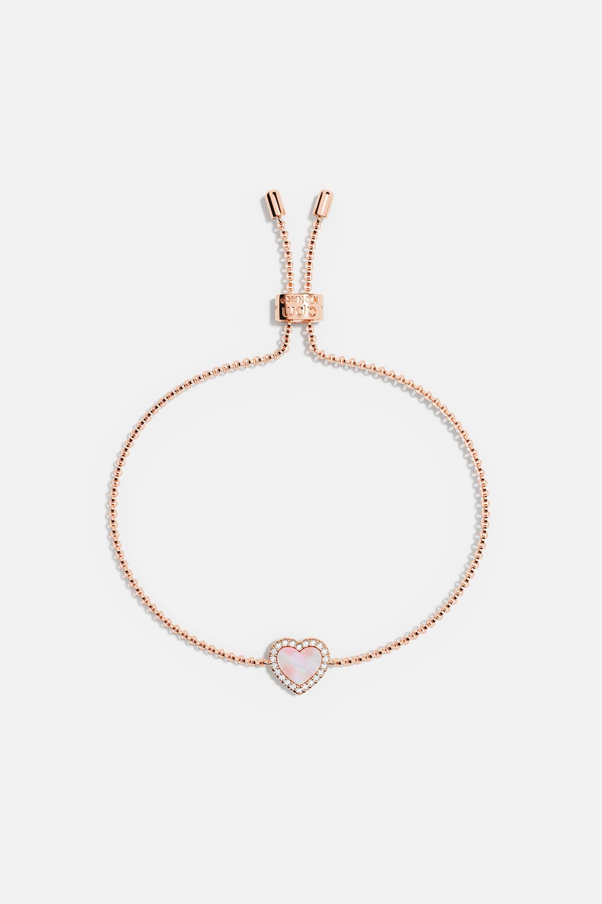 Bracelets APM Monaco rose gold adjustable bracelet with a heart pendant featuring a pink nacre center.