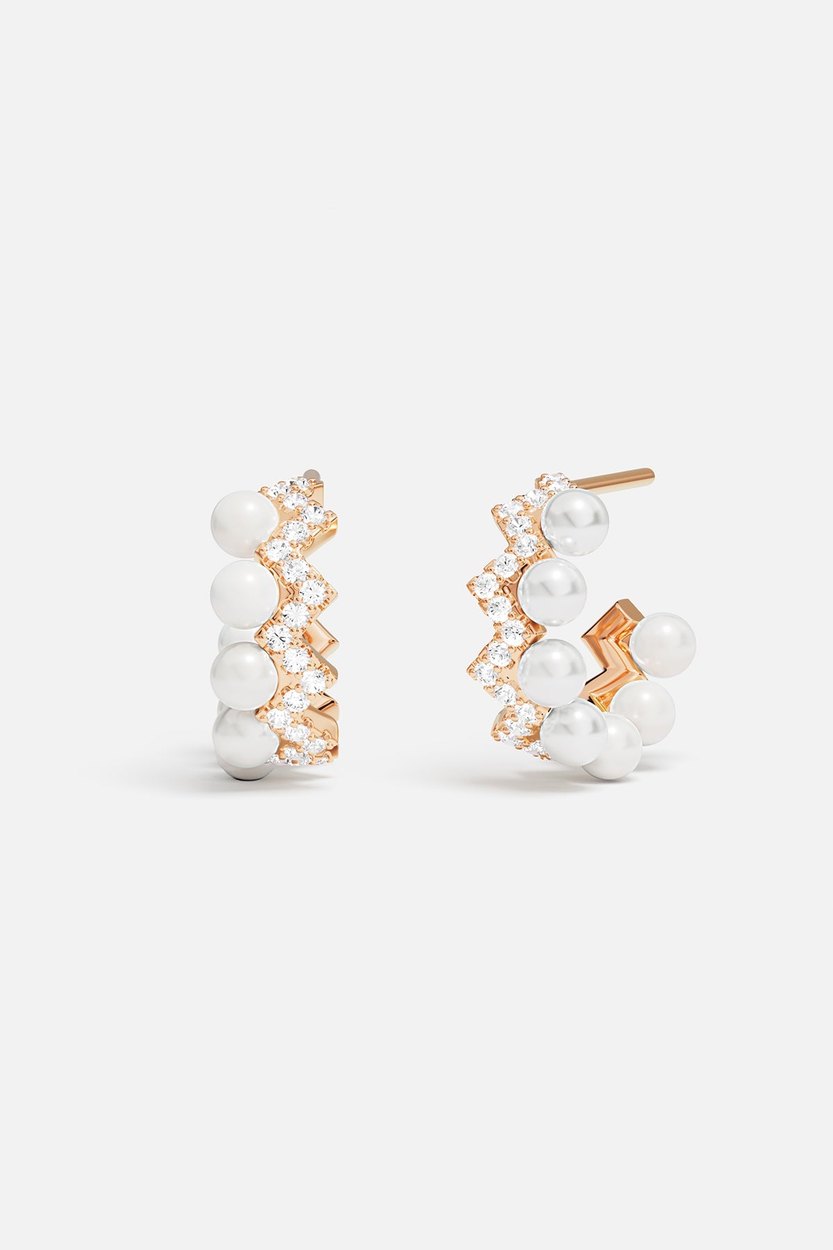 Earrings APM Monaco rose gold up-and-down hoop design with pearls and small gems.