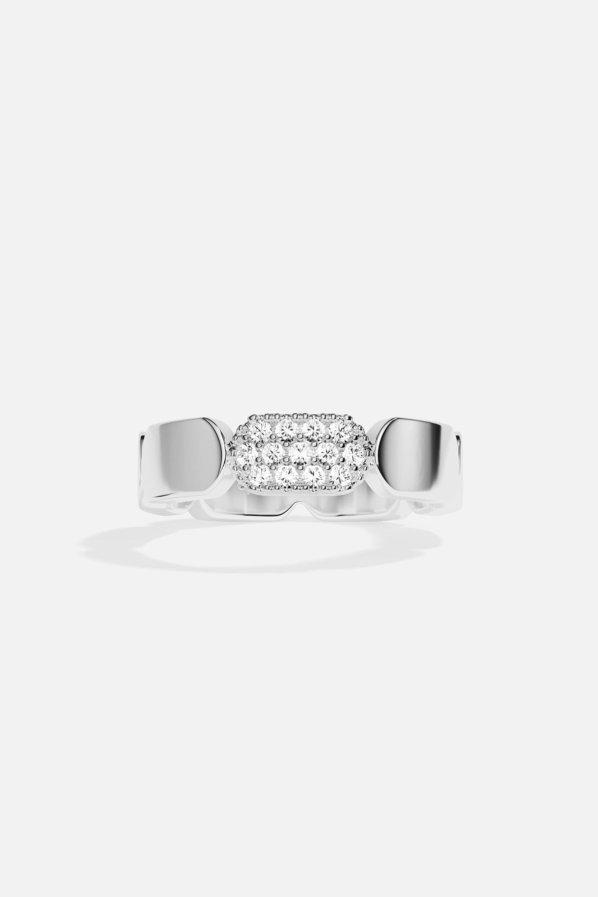 Silver ring with white stones on a white background