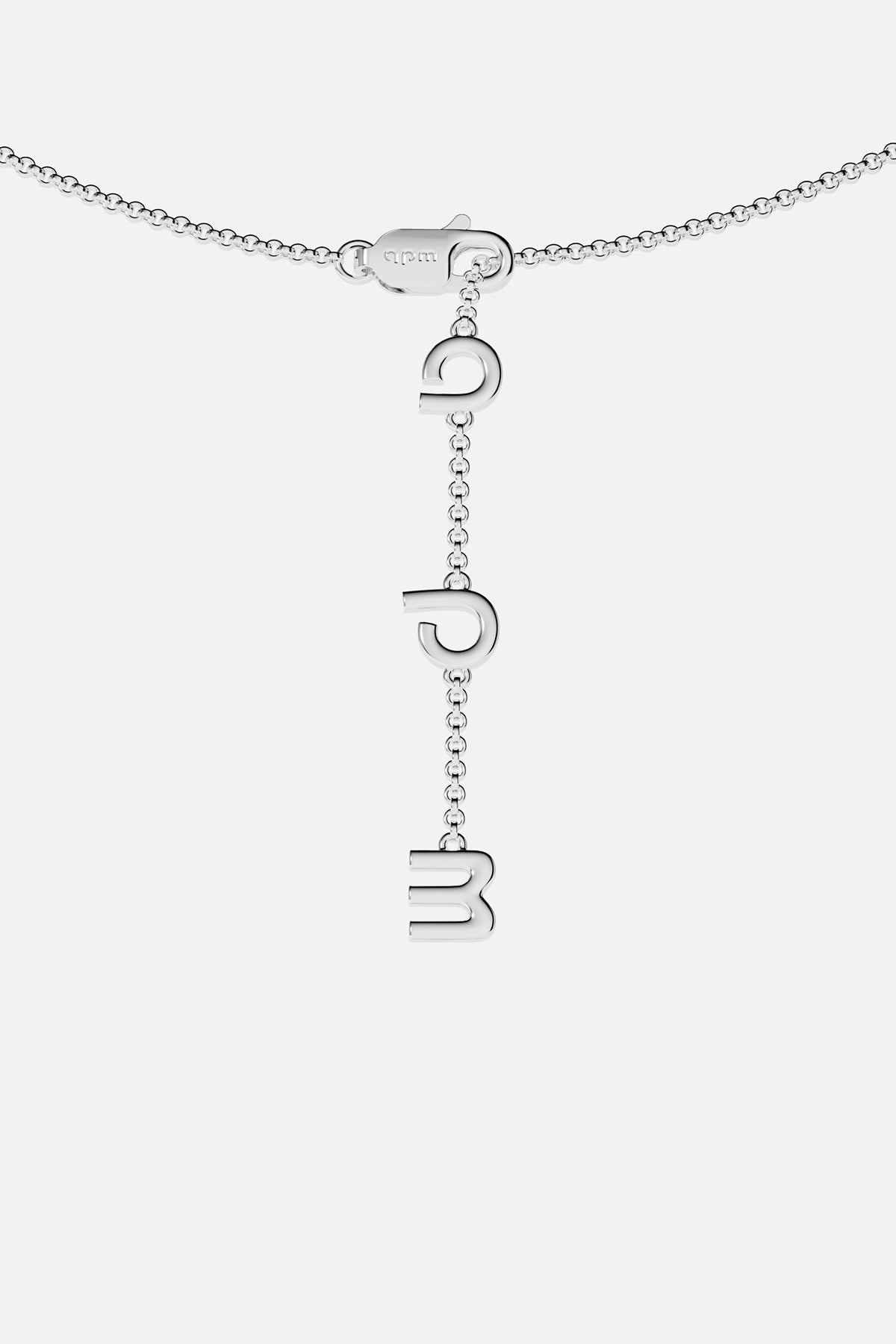Necklaces APM Monaco, white tone, maille marine chain with a pendant of three hanging letters.