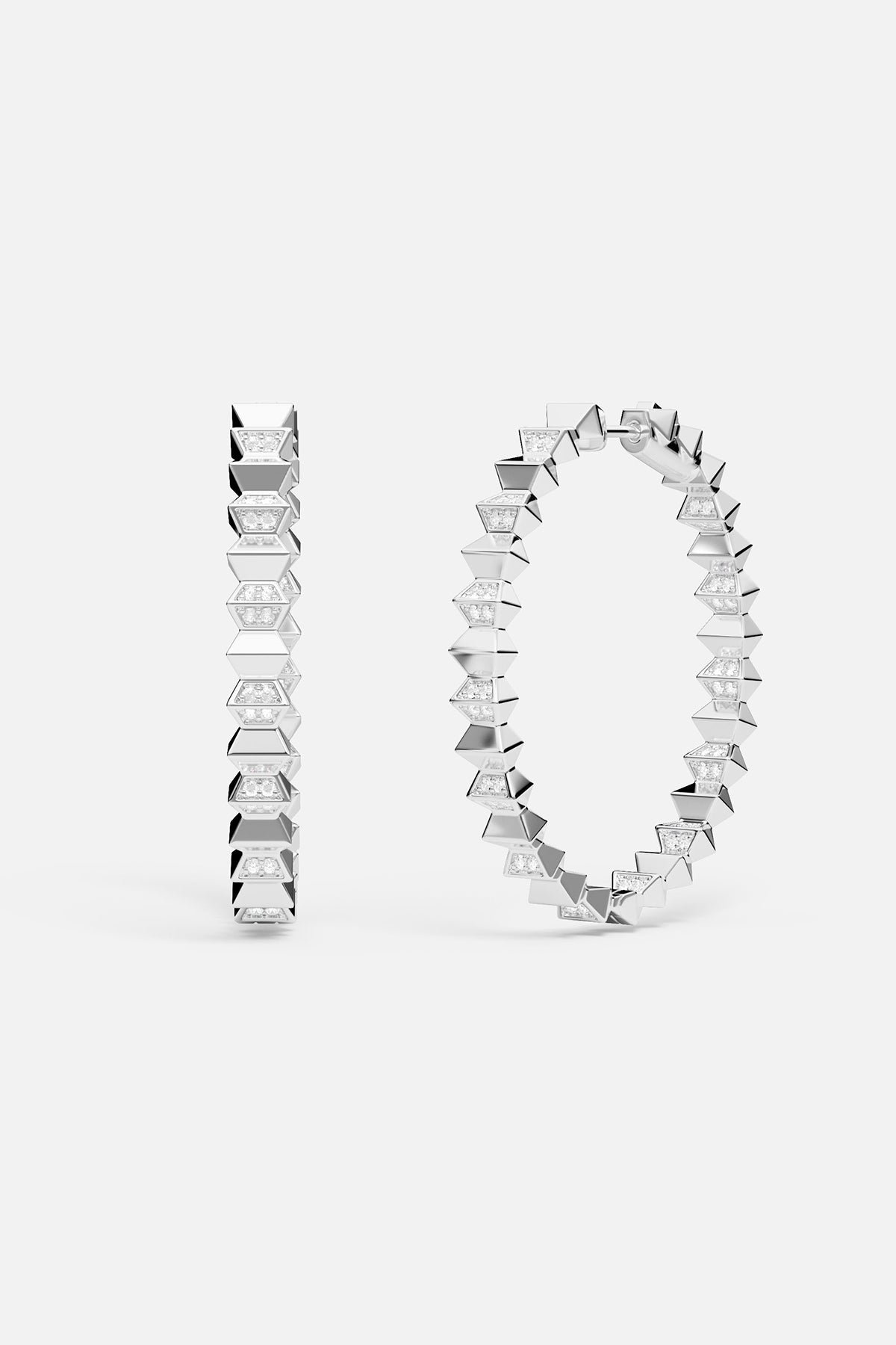 hoop earrings with geometric design on a white background