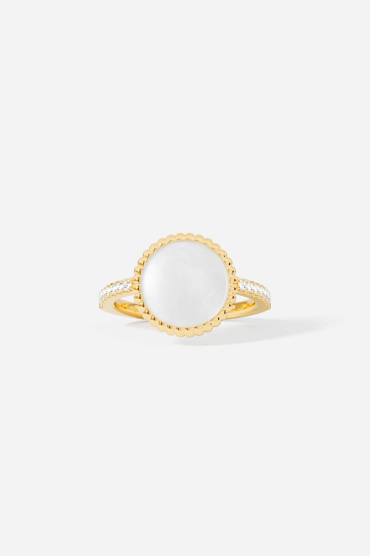 Ring APM Monaco: Yellow gold ring with a white nacre pearl centerpiece, scalloped edge, and pave diamonds along the band.