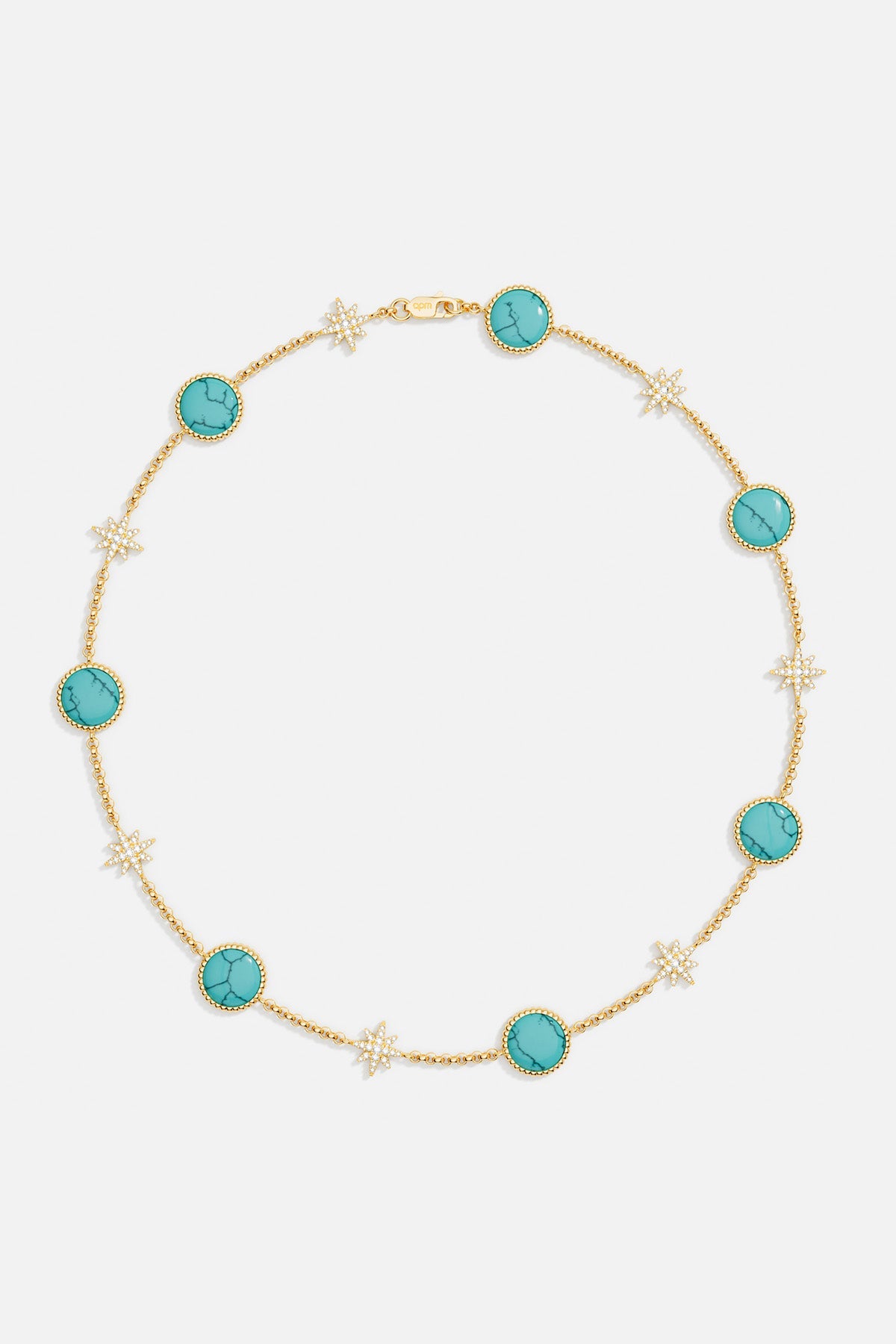 Necklaces APM Monaco: a gold-tone choker featuring lagoon turquoise stones and diamond-studded star accents.