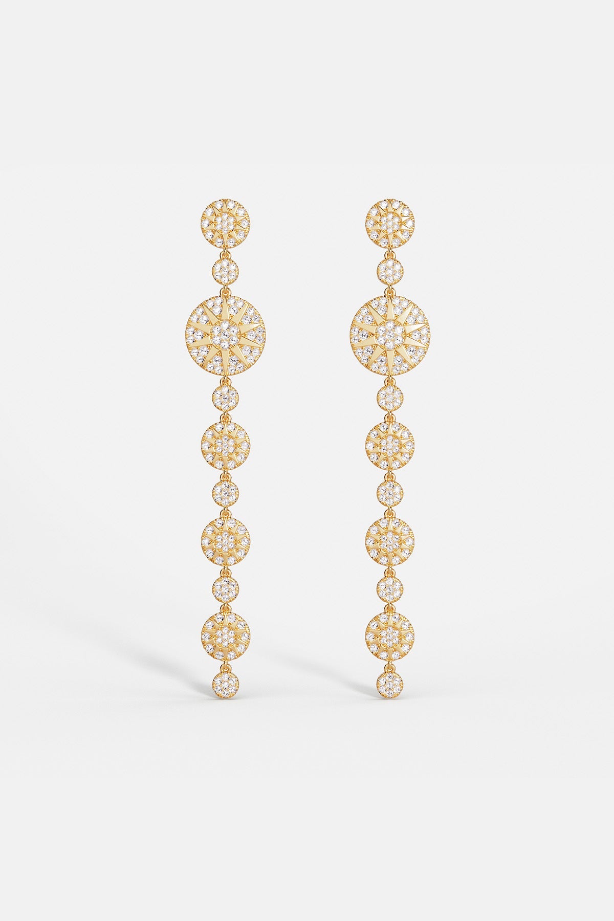 Earrings APM Monaco: long yellow-gold-tone drop earrings with pavé clear stones set in circular links.