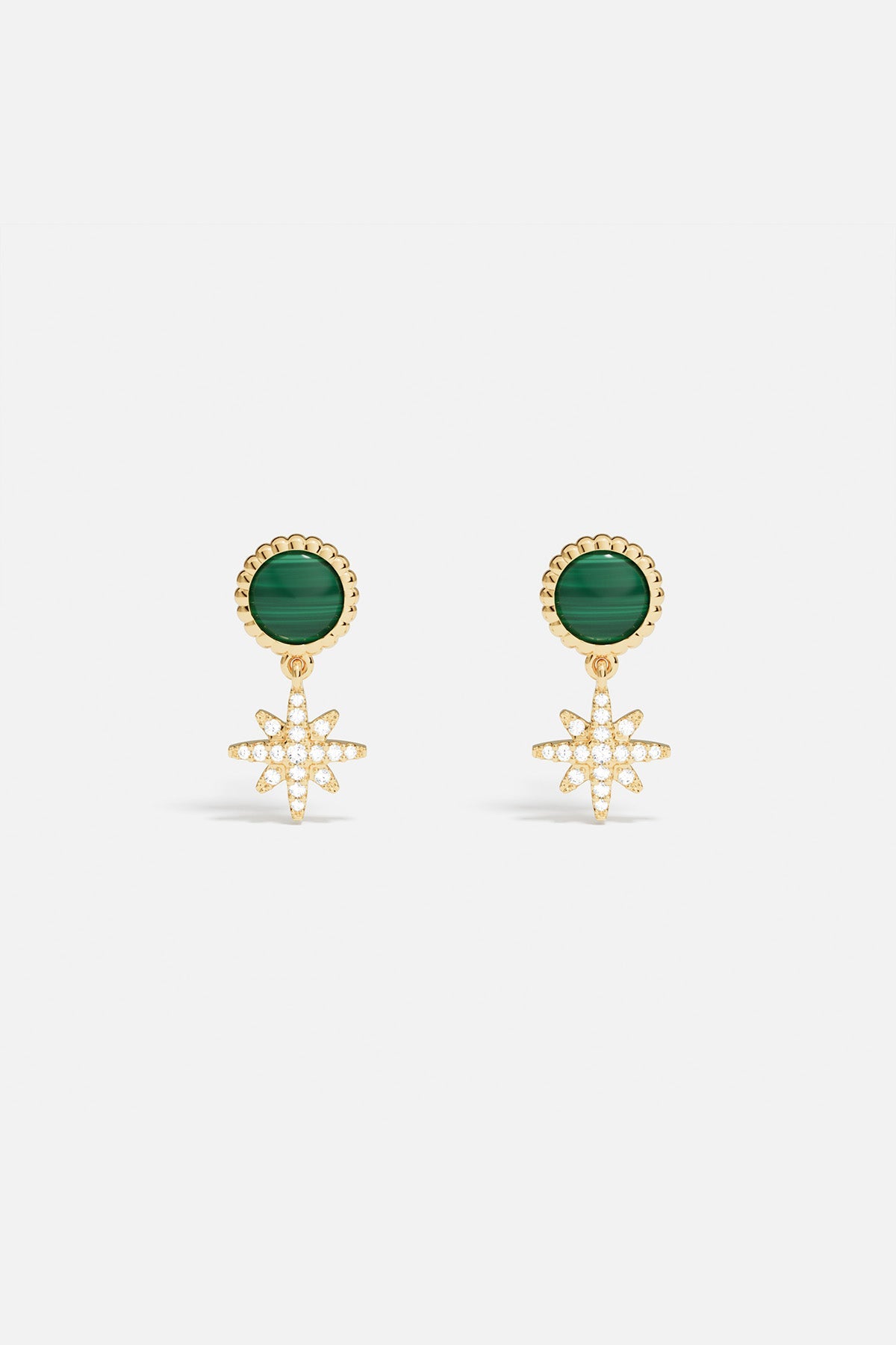 Earrings APM Monaco: green malachite studs with starburst pendants, a statement fashion jewelry piece.