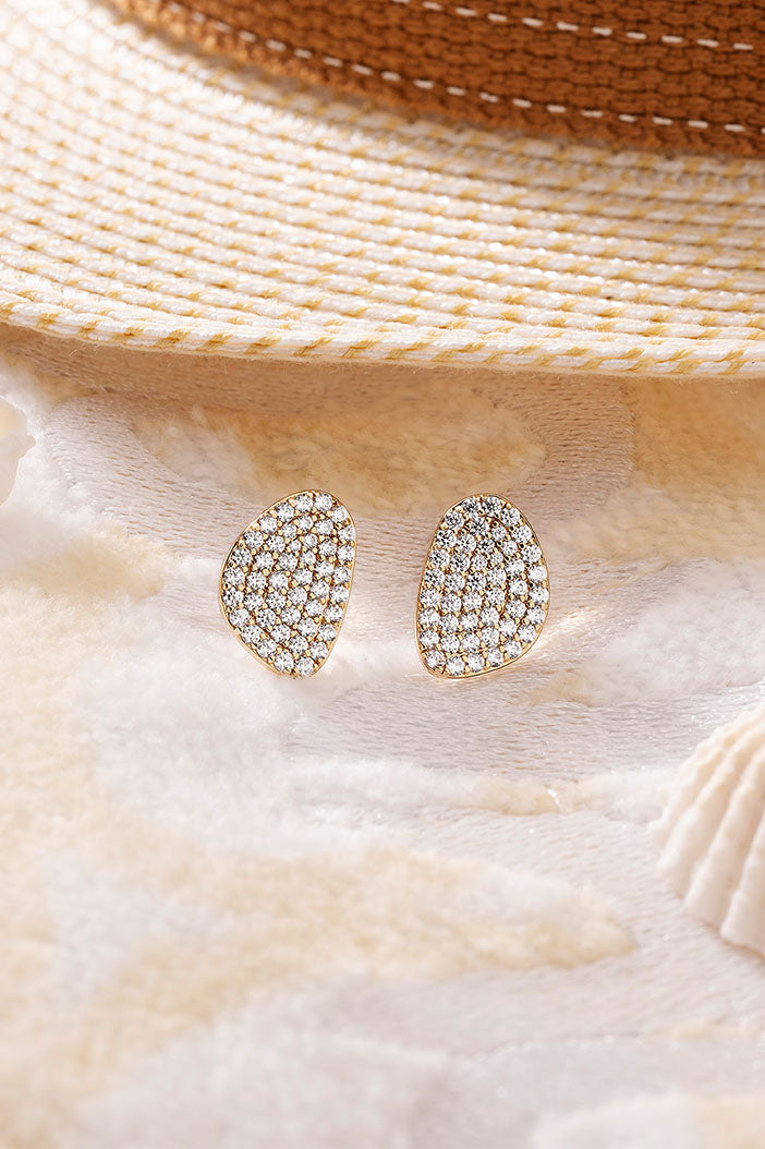 Earrings APM Monaco, yellow gold pavé stud earrings with diamonds.