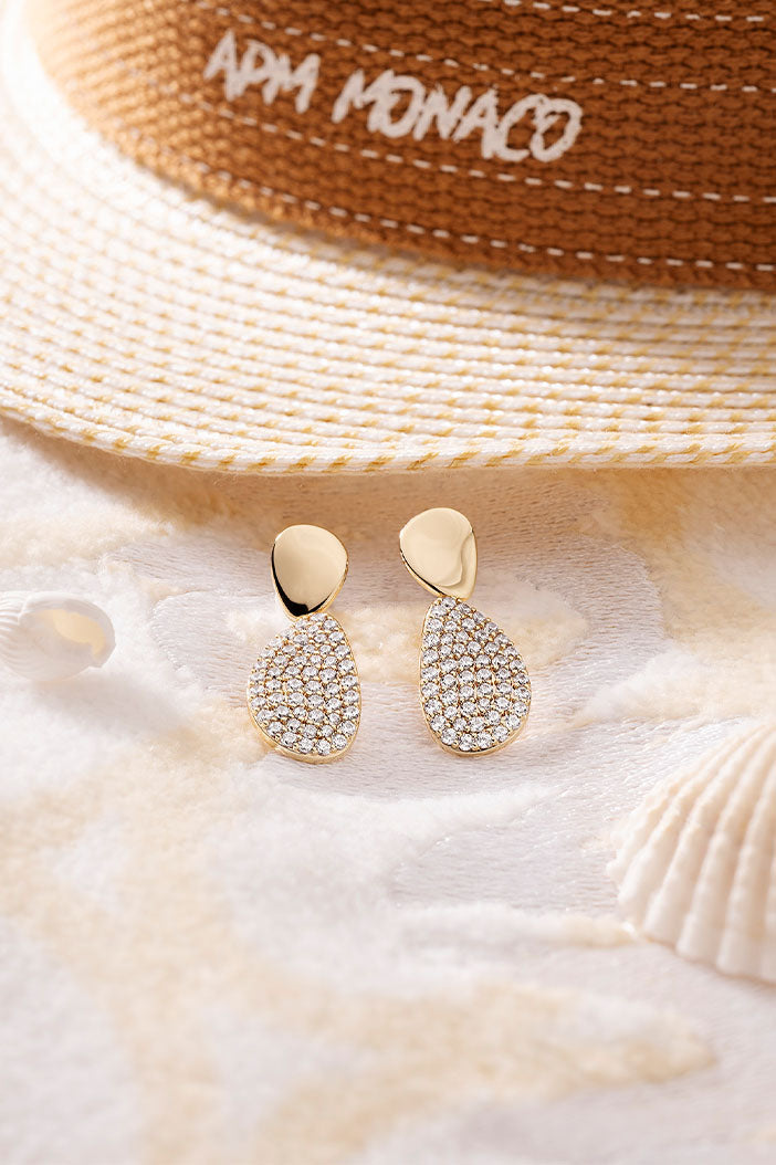 Earrings APM Monaco in yellow gold tone with pavé rhinestones.